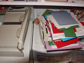 Scrap bin by table top cutter Scrap bin by table top cutter