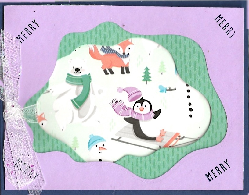 Handmade greeting card created with the free Penguin Playmates designer series paper and the layering Diorama dies