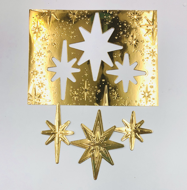 image shows gold foil embossed and die-cut with Stars at Night Hybrid embossing folder